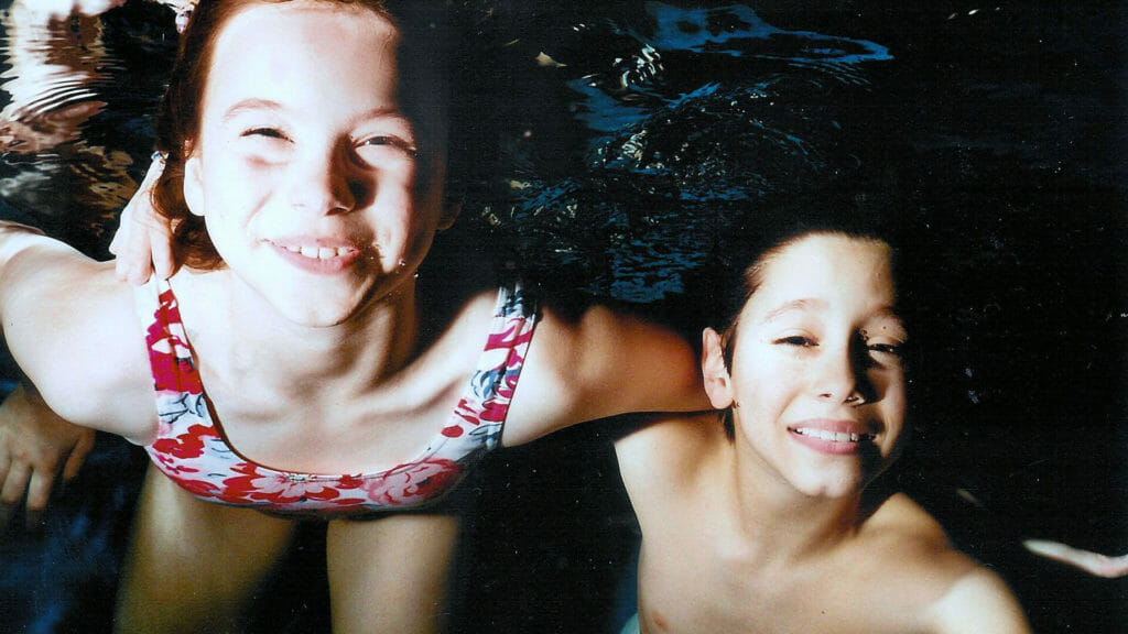 two children in a swimming lesson