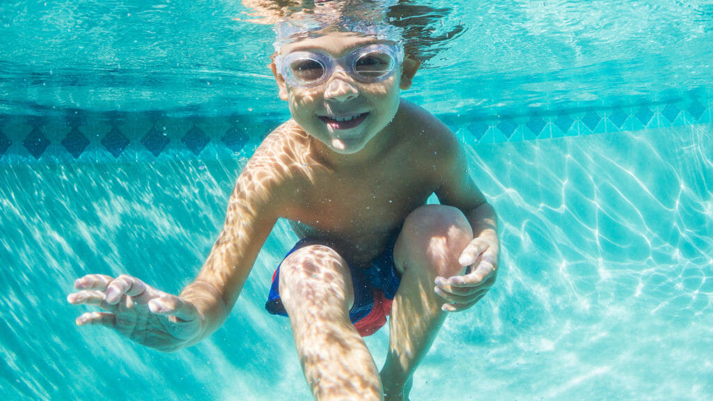 adobe photograph happy child underwater